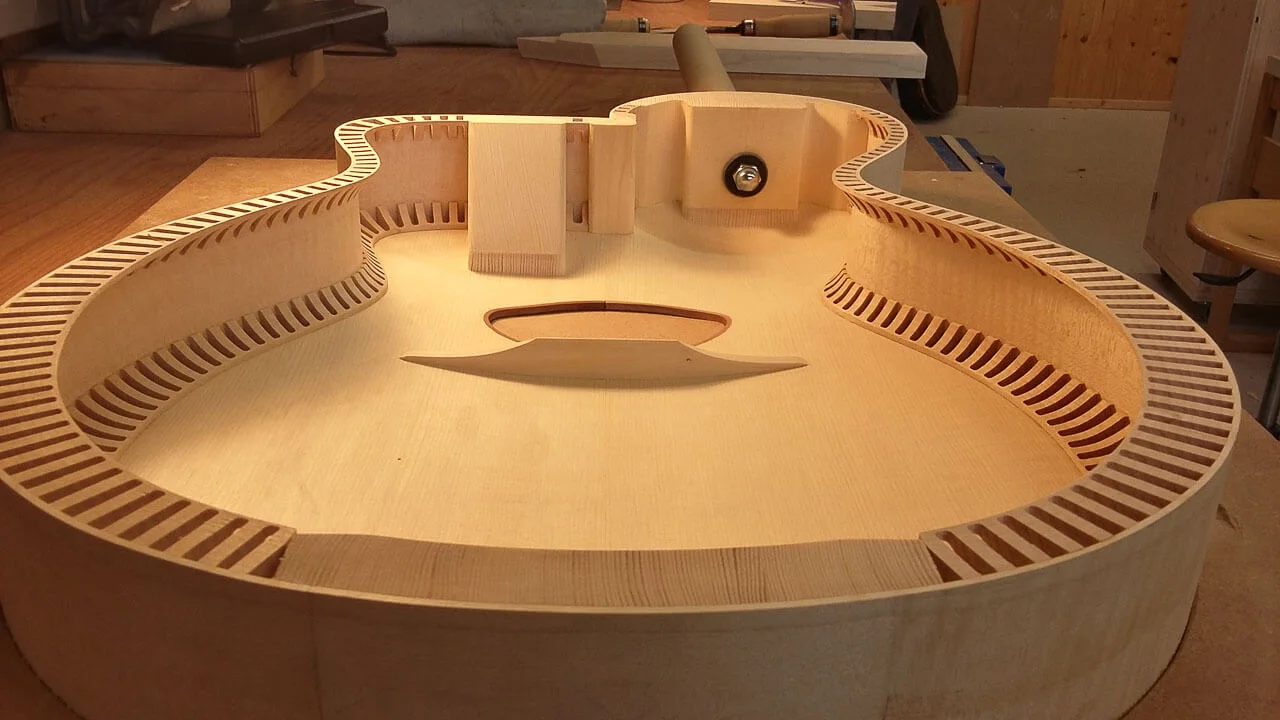 Open instrument body with bracing