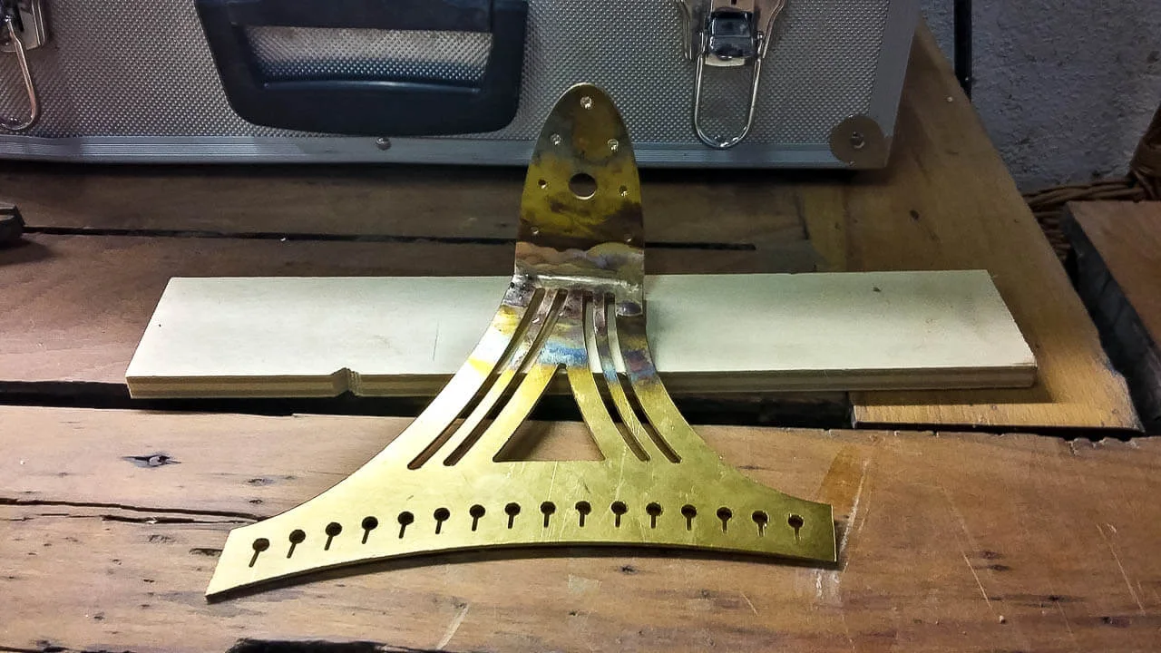 Custom tailpiece on a workbench