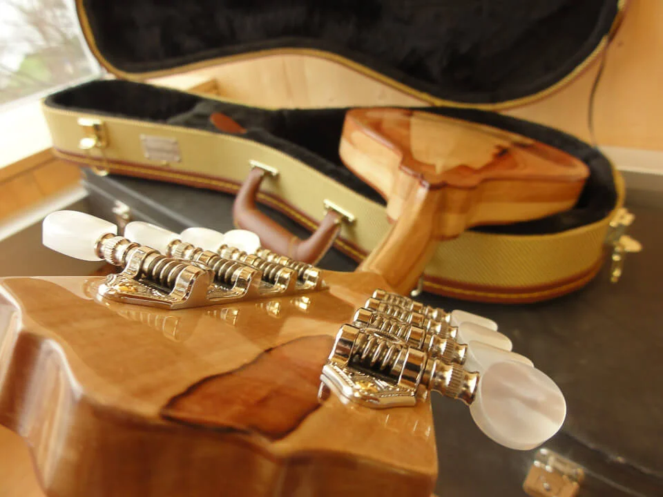 Headstock and tuning machines